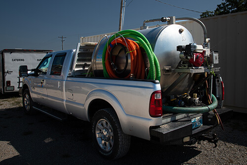 natural disaster response vehicle with vacuum system