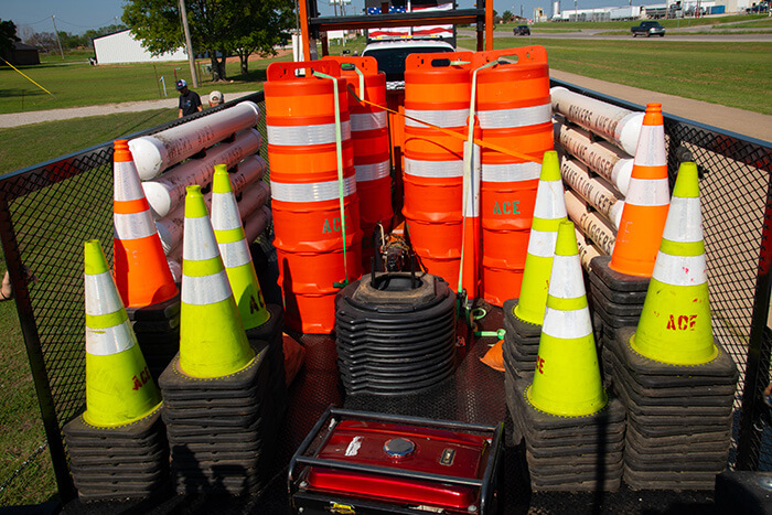 Traffic cones, signs, flashers, equipment